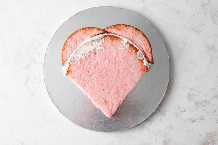 A cake cut into the shape of a heart