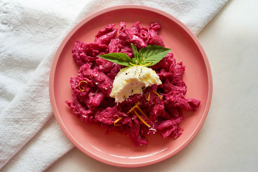 A plate of Bright Pink Barbie-Inspired Beet Pasta