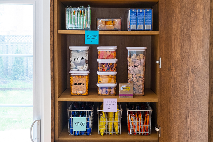 An organized pantry labeled with 3PM Post-Its
