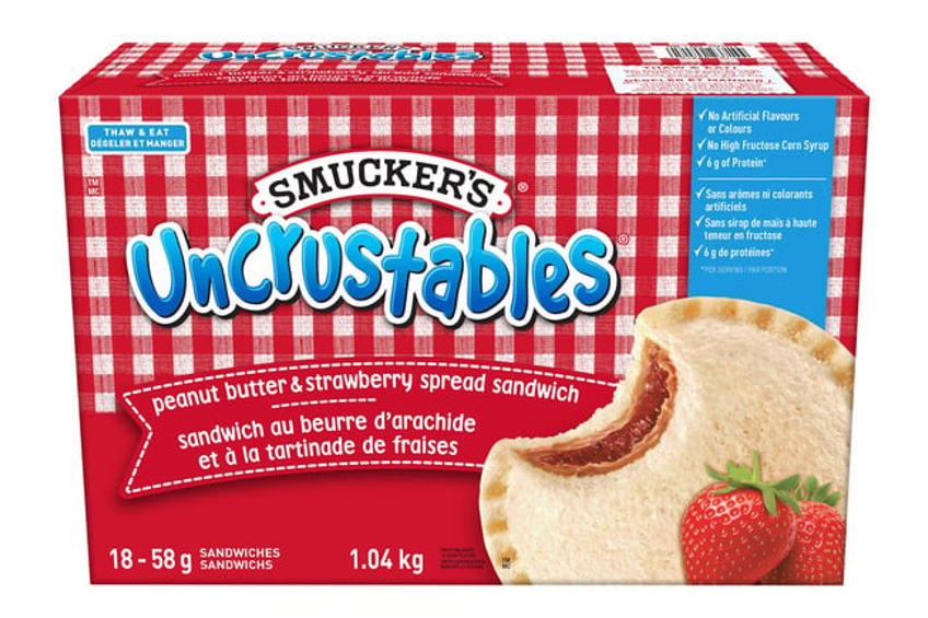A package of peanut butter and strawberry jam Uncrustables by Smuckers