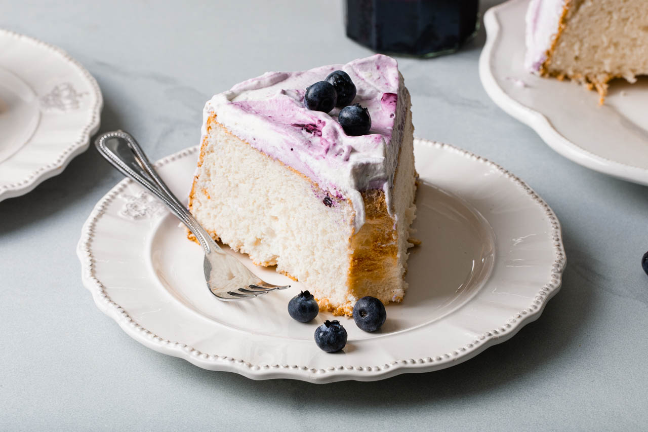 Angel food cake with blueberry frosting