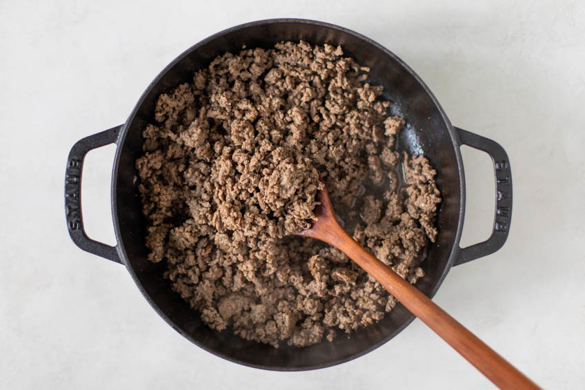 Ground beef cooking in a skillet