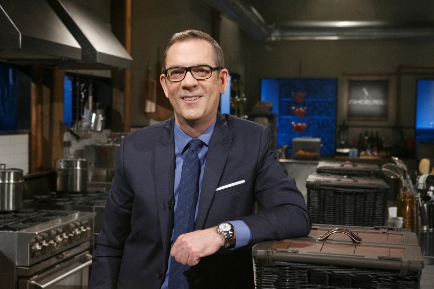 Chopped host Ted Allen poses on set during Season 39.