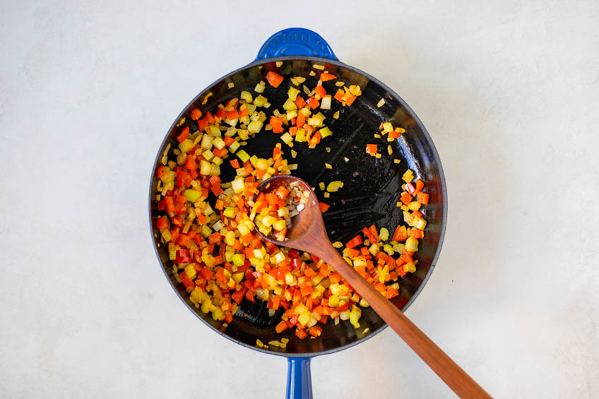 Vegetables sauteing in a skillet