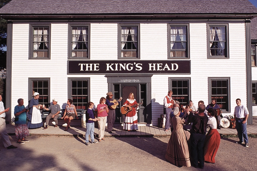 The exterior of the King's Head Inn Restaurant in New Brunswick, with white siding and green trim.