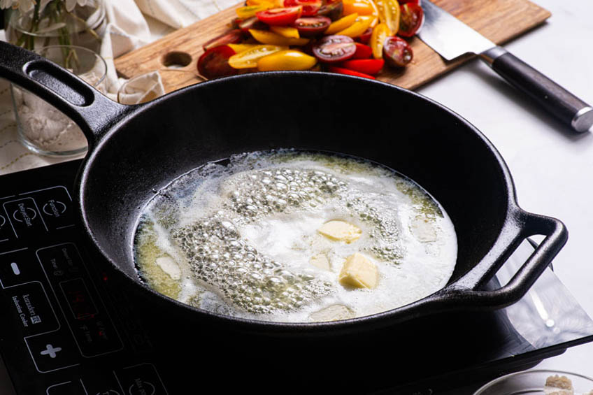 Butter sizzling in a skillet