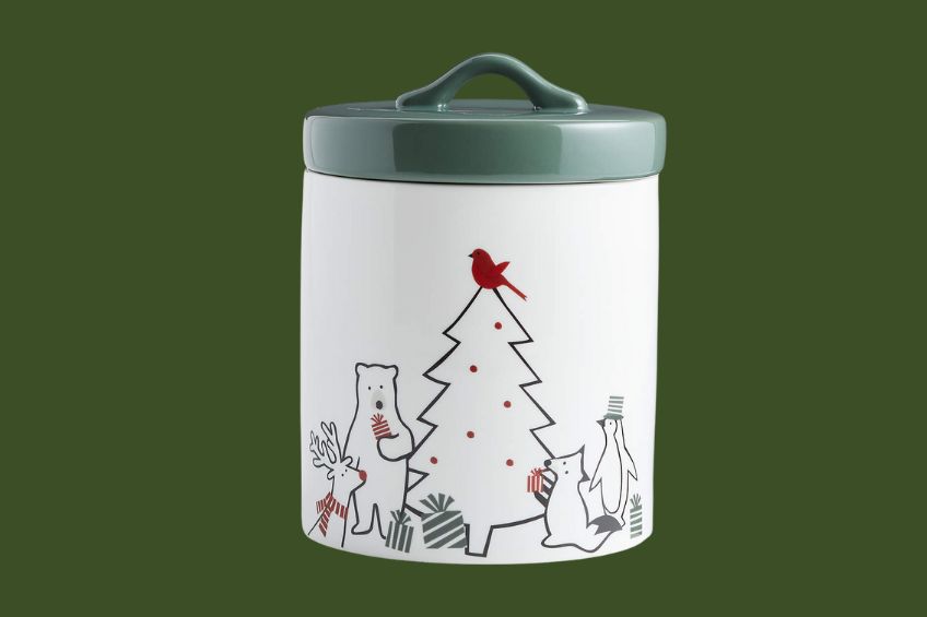White and green cookie jar with animal designs