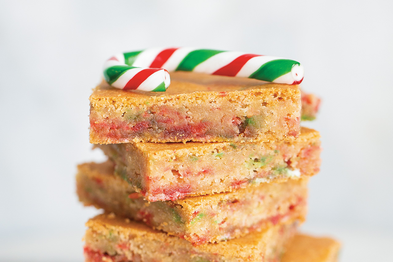 Karlynn Johnston's candy cane blondies stacked, and topped with a single red, white and green mini-candy cane.