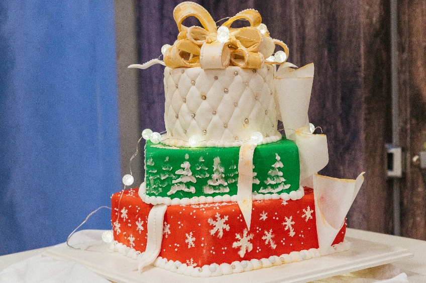 3-Tiered Devil’s Food Cake with Peanut Butter Filling, Chocolate Ganache and Vanilla Icing, decorated in Fondant from Holiday Baking Championship Season 8.