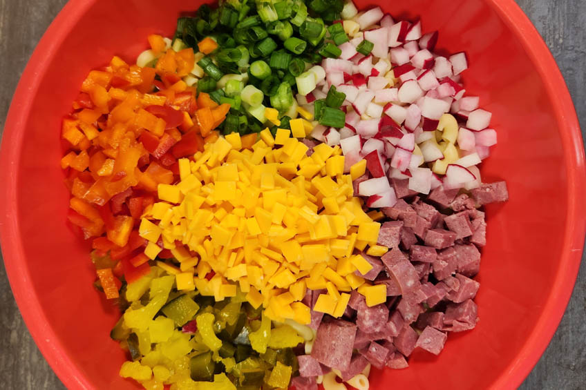 Inuvialuit-Style Macaroni Salad ingredients together in a bowl
