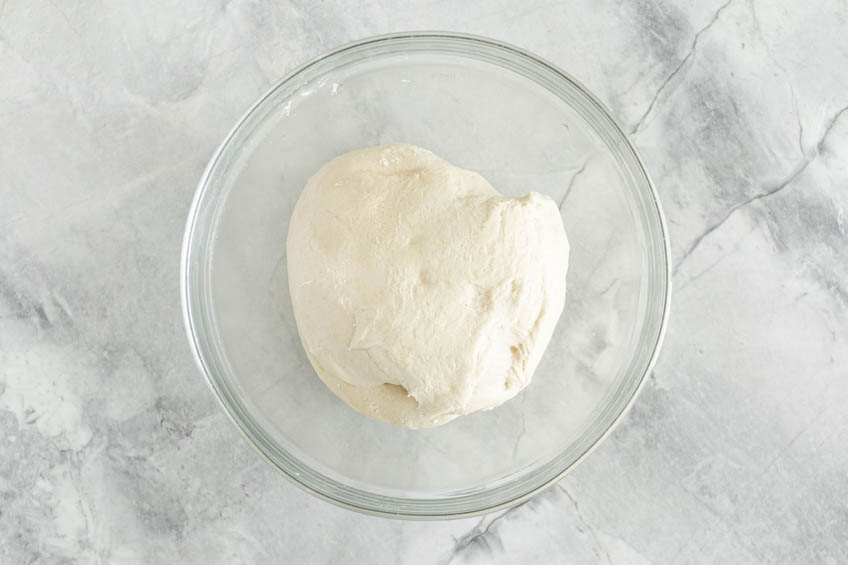 Risen dough in a bowl