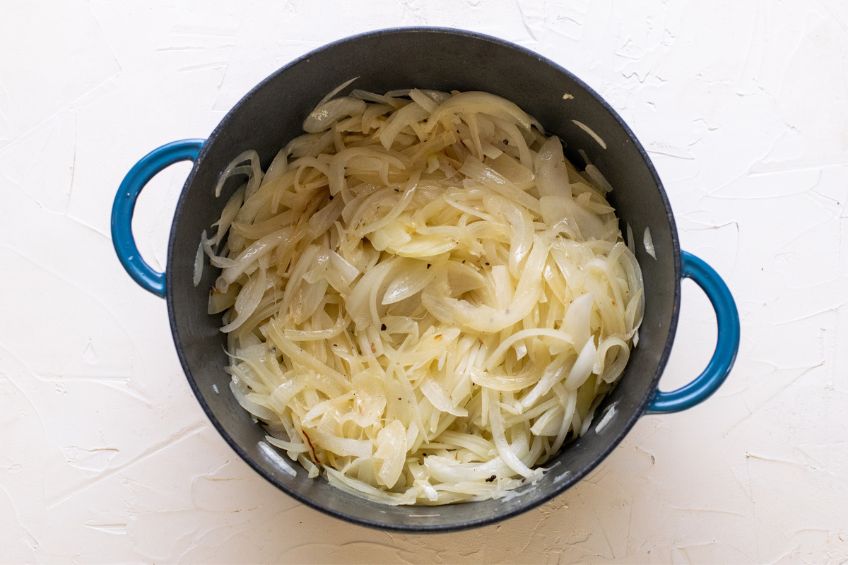 Cooked onions in a Dutch oven