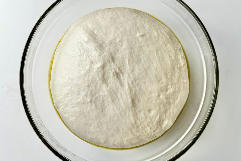 Pretzel dough in a mixing bowl