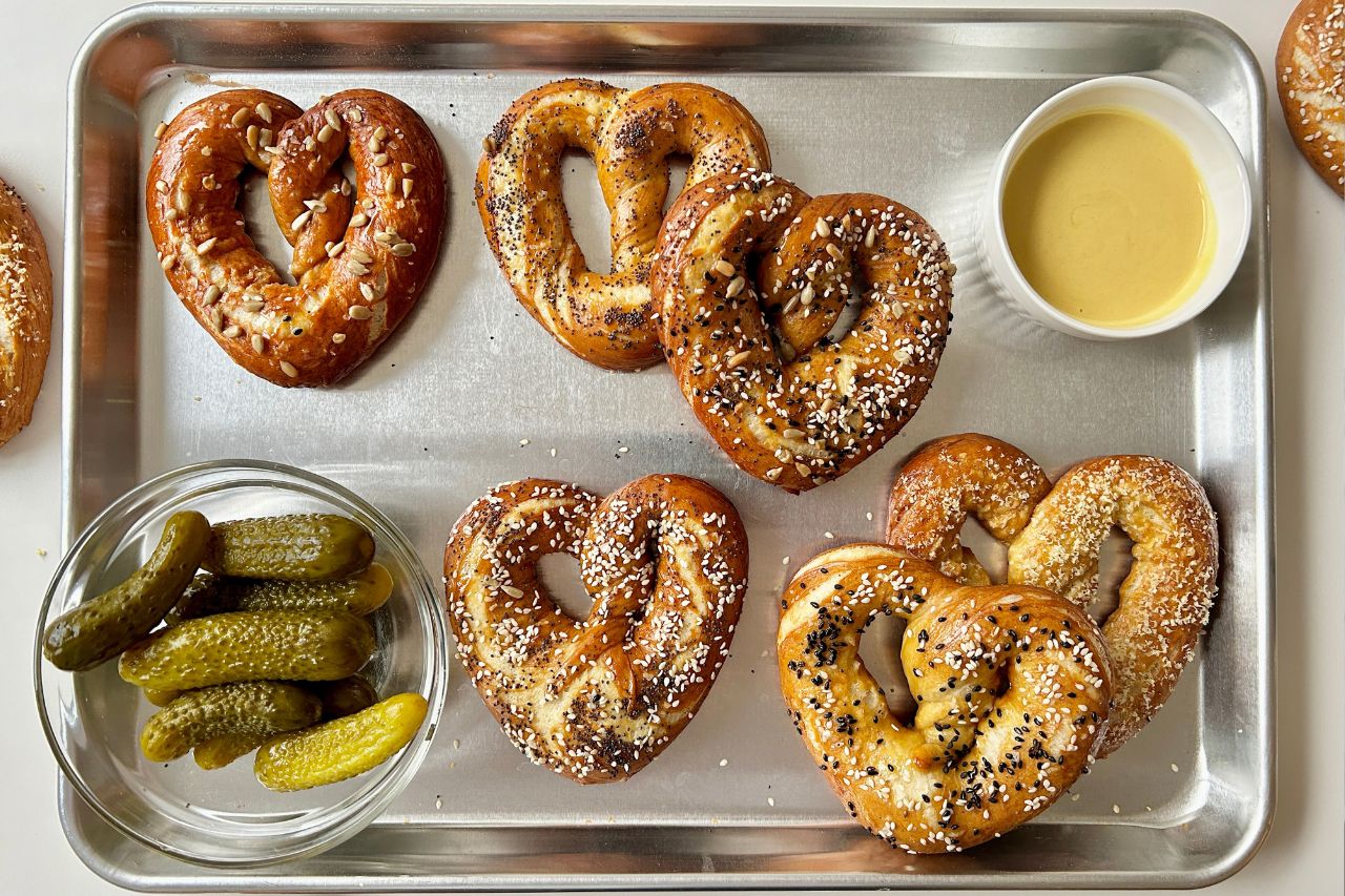 Honey mustard heart pretzels on a sheet pan
