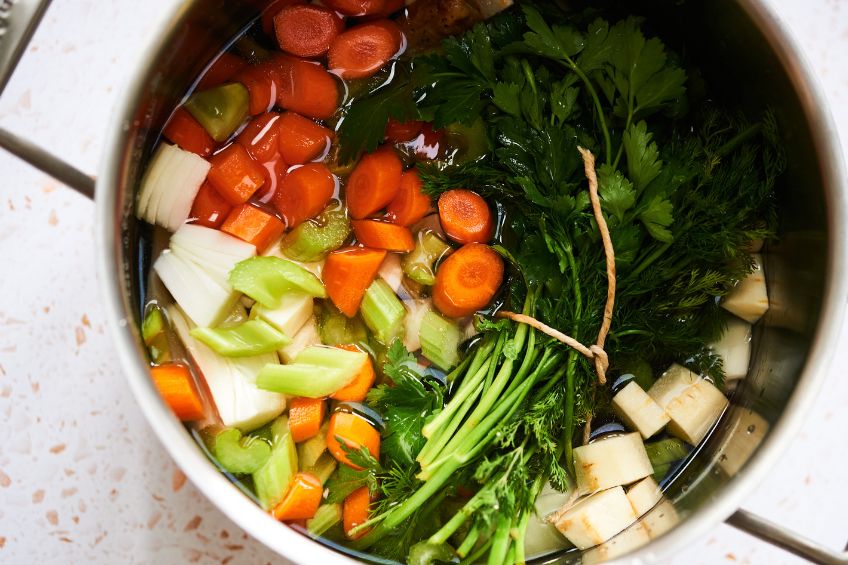 Broth ingredients in a large stock pot