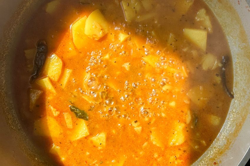 Cooked potato curry in pan
