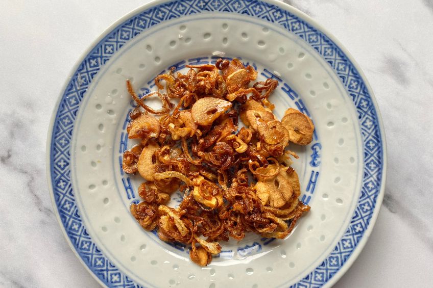 Crispy shallots and garlic on a plate