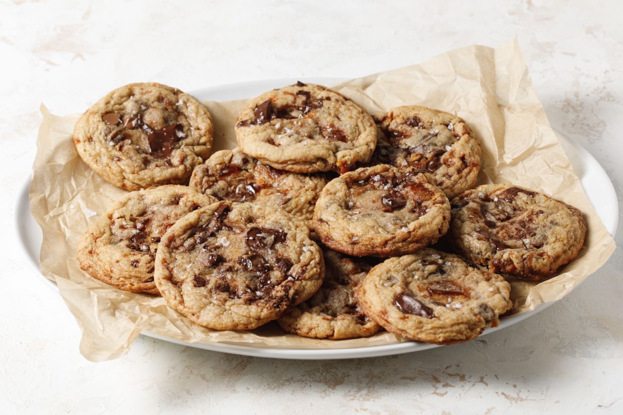 Salted caramel chocolate chip cookies baked and on a plate