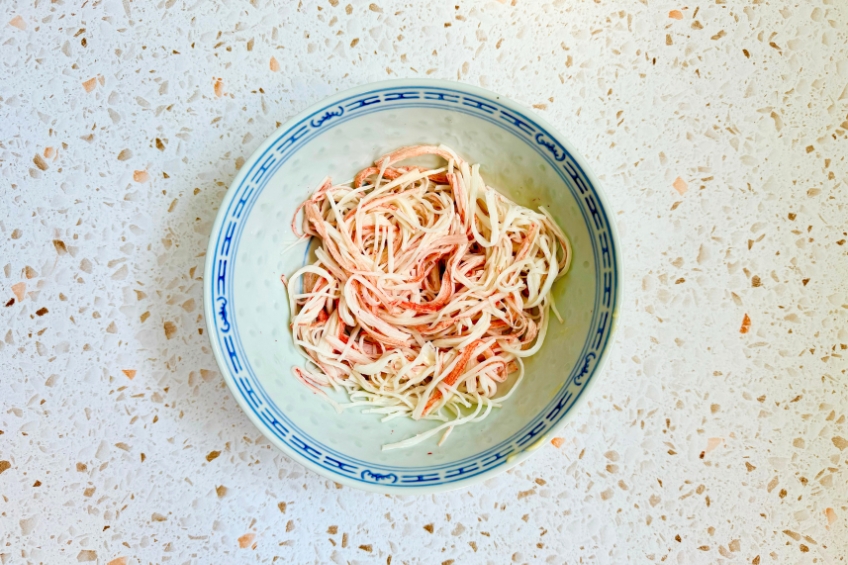 Surimi tossed with mayonnaise