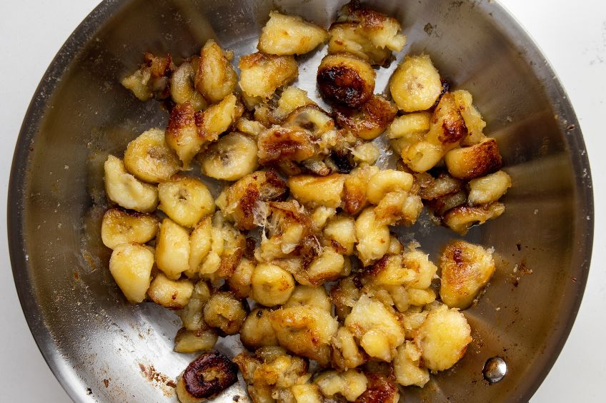 bananas caramelized in a steel pan