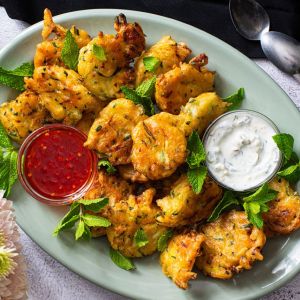 Zucchini Fritters with Harissa Honey and Mint Yogurt