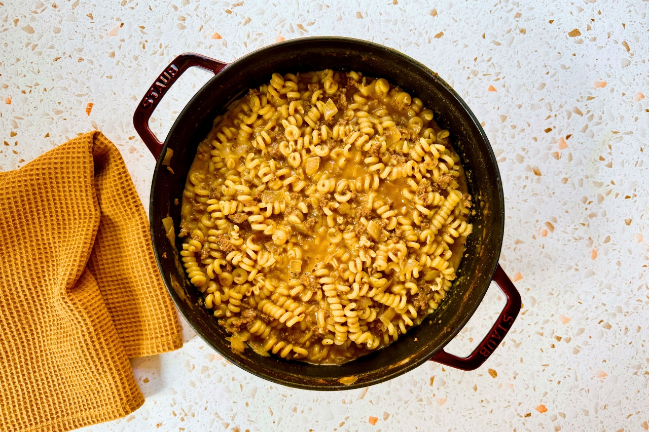 Cheesy hamburger pasta in a Dutch oven